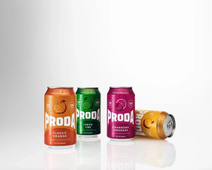 Four PRODA cans: Classic Orange, Lemon Lime, Strawberry Lemonade and Golden Apple
