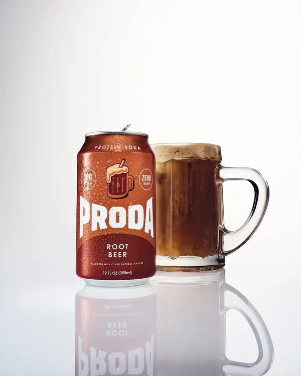 A can of PRODA Root Beer beside a frosty mug